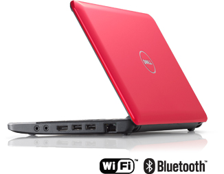 Dell Inspiron Mini 10 netbook computer with coffee mug
